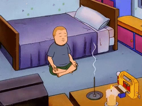 Edmund Teh avatar — a cartoon character meditating